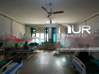 Dengue-infected patients undergo treatment at Sukraraj Tropical and Infectious Disease Hospital in Kathmandu, Nepal, on September 24, 2024,...