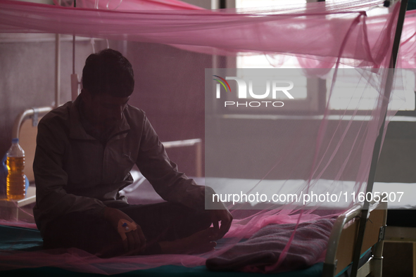 A dengue-infected patient undergoes treatment at Sukraraj Tropical and Infectious Disease Hospital in Kathmandu, Nepal, on September 24, 202...