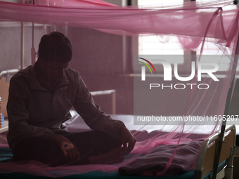 A dengue-infected patient undergoes treatment at Sukraraj Tropical and Infectious Disease Hospital in Kathmandu, Nepal, on September 24, 202...