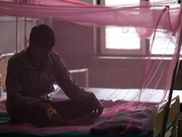 A dengue-infected patient undergoes treatment at Sukraraj Tropical and Infectious Disease Hospital in Kathmandu, Nepal, on September 24, 202...