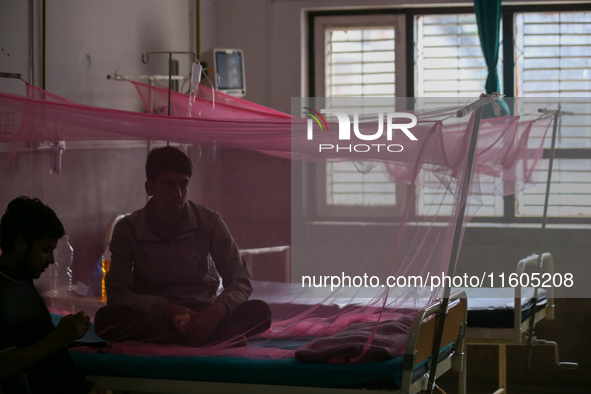 A dengue-infected patient undergoes treatment at Sukraraj Tropical and Infectious Disease Hospital in Kathmandu, Nepal, on September 24, 202...