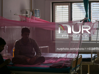 A dengue-infected patient undergoes treatment at Sukraraj Tropical and Infectious Disease Hospital in Kathmandu, Nepal, on September 24, 202...