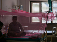 A dengue-infected patient undergoes treatment at Sukraraj Tropical and Infectious Disease Hospital in Kathmandu, Nepal, on September 24, 202...