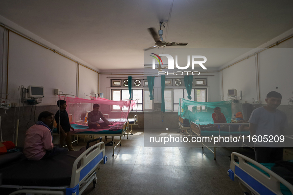 Dengue-infected patients undergo treatment at Sukraraj Tropical and Infectious Disease Hospital in Kathmandu, Nepal, on September 24, 2024,...