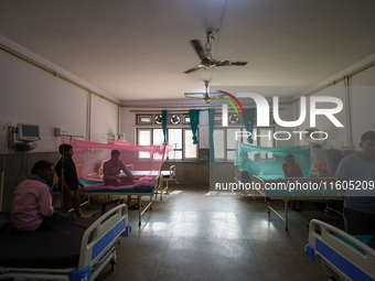 Dengue-infected patients undergo treatment at Sukraraj Tropical and Infectious Disease Hospital in Kathmandu, Nepal, on September 24, 2024,...