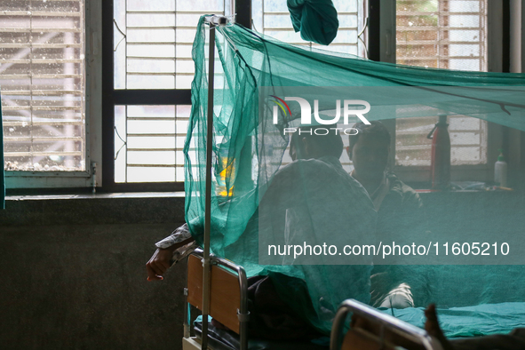 A dengue-infected patient undergoes treatment at Sukraraj Tropical and Infectious Disease Hospital in Kathmandu, Nepal, on September 24, 202...