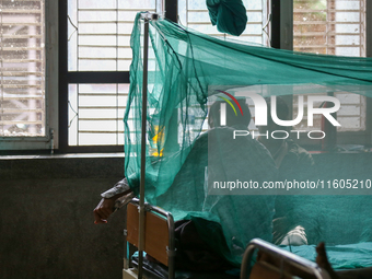 A dengue-infected patient undergoes treatment at Sukraraj Tropical and Infectious Disease Hospital in Kathmandu, Nepal, on September 24, 202...