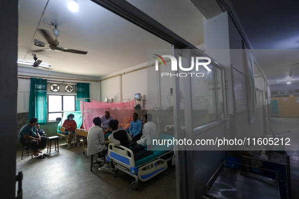 Dengue-infected patients undergo treatment at Sukraraj Tropical and Infectious Disease Hospital in Kathmandu, Nepal, on September 24, 2024,...