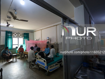 Dengue-infected patients undergo treatment at Sukraraj Tropical and Infectious Disease Hospital in Kathmandu, Nepal, on September 24, 2024,...