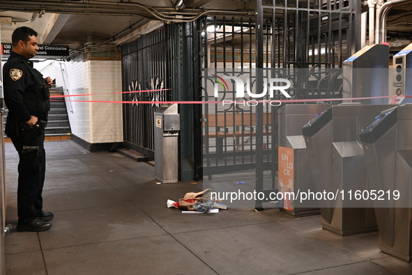 Bloody clothes and crime scene tape are at the scene. A man is stabbed at the East 138th Street and Grand Concourse MTA subway train station...