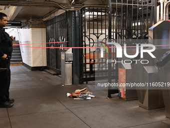 Bloody clothes and crime scene tape are at the scene. A man is stabbed at the East 138th Street and Grand Concourse MTA subway train station...