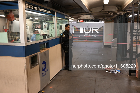 Bloody clothes and crime scene tape are at the scene. A man is stabbed at the East 138th Street and Grand Concourse MTA subway train station...