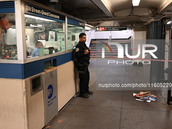 Bloody clothes and crime scene tape are at the scene. A man is stabbed at the East 138th Street and Grand Concourse MTA subway train station...