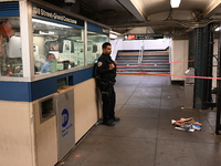 Bloody clothes and crime scene tape are at the scene. A man is stabbed at the East 138th Street and Grand Concourse MTA subway train station...