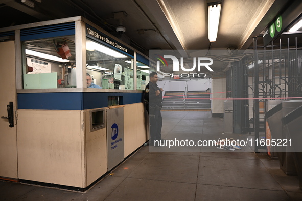 Bloody clothes and crime scene tape are at the scene. A man is stabbed at the East 138th Street and Grand Concourse MTA subway train station...