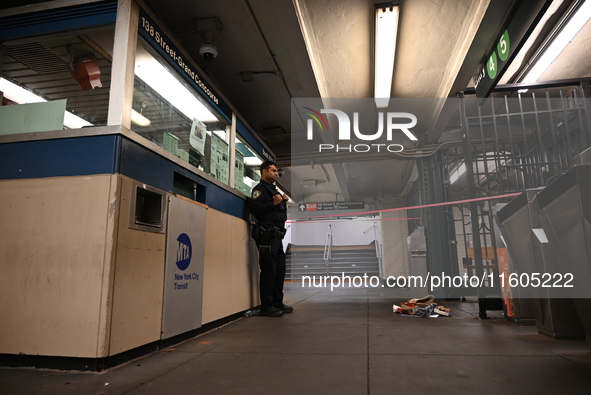 Bloody clothes and crime scene tape are at the scene. A man is stabbed at the East 138th Street and Grand Concourse MTA subway train station...