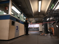 Bloody clothes and crime scene tape are at the scene. A man is stabbed at the East 138th Street and Grand Concourse MTA subway train station...