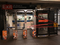 Bloody clothes and crime scene tape are at the scene. A man is stabbed at the East 138th Street and Grand Concourse MTA subway train station...