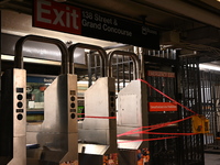 Bloody clothes and crime scene tape are at the scene. A man is stabbed at the East 138th Street and Grand Concourse MTA subway train station...