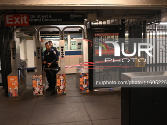 Bloody clothes and crime scene tape are at the scene. A man is stabbed at the East 138th Street and Grand Concourse MTA subway train station...