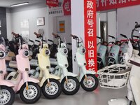 Consumers buy an electric bicycle at an electric bicycle trade-in promotion event in Yongnian district of Handan, China, on September 24, 20...