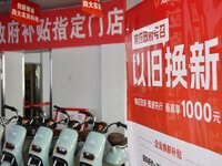 Consumers buy an electric bicycle at an electric bicycle trade-in promotion event in Yongnian district of Handan, China, on September 24, 20...