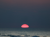 Sun sets over Baltic Sea near Leba, famous pomeranian tourist resort in northern Poland as Autumn begins on September 22, 2024. (