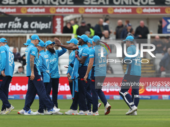 England's Jofra Archer celebrates with Adil Rashid after he dismisses Australia's Matthew Short during the Metro Bank One Day Series match b...