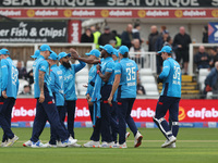 England's Jofra Archer celebrates with Adil Rashid after he dismisses Australia's Matthew Short during the Metro Bank One Day Series match b...