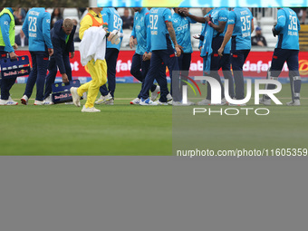 England's Jofra Archer celebrates with Adil Rashid after he dismisses Australia's Matthew Short during the Metro Bank One Day Series match b...