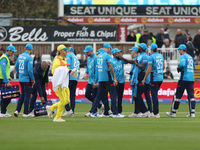 England's Jofra Archer celebrates with Adil Rashid after he dismisses Australia's Matthew Short during the Metro Bank One Day Series match b...