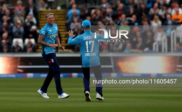 Brydon Carse of England celebrates taking the wicket of Mitchell Marsh during the Metro Bank One Day Series match between England and Austra...