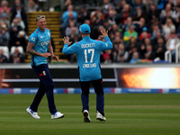 Brydon Carse of England celebrates taking the wicket of Mitchell Marsh during the Metro Bank One Day Series match between England and Austra...