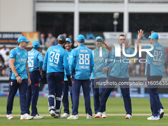 England's Will Jacks celebrates with his teammates after taking the wicket of Marnus Labuschagne during the Metro Bank One Day Series match...