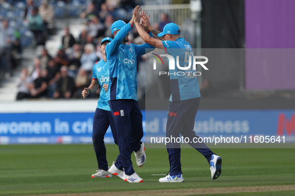 England's Brydon Carse celebrates after catching Australia's Steve Smith off the bowling of Jofra Archer during the Metro Bank One Day Serie...