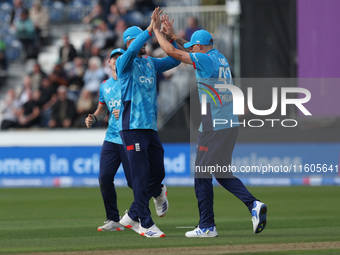 England's Brydon Carse celebrates after catching Australia's Steve Smith off the bowling of Jofra Archer during the Metro Bank One Day Serie...