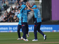 England's Brydon Carse celebrates after catching Australia's Steve Smith off the bowling of Jofra Archer during the Metro Bank One Day Serie...