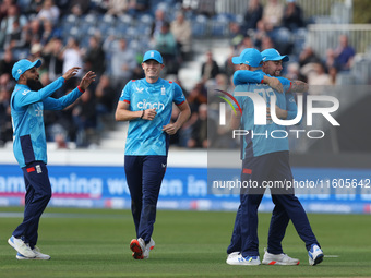 England's Brydon Carse celebrates after catching Australia's Steve Smith off the bowling of Jofra Archer during the Metro Bank One Day Serie...