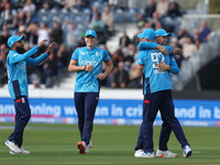 England's Brydon Carse celebrates after catching Australia's Steve Smith off the bowling of Jofra Archer during the Metro Bank One Day Serie...