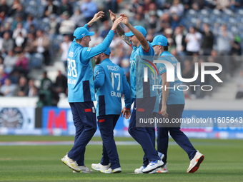 England's Brydon Carse celebrates after catching Australia's Steve Smith off the bowling of Jofra Archer during the Metro Bank One Day Serie...