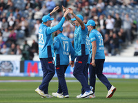 England's Brydon Carse celebrates after catching Australia's Steve Smith off the bowling of Jofra Archer during the Metro Bank One Day Serie...