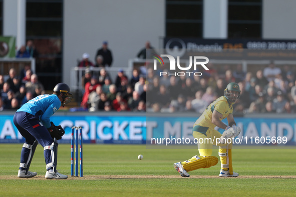 Australia's Glenn Maxwell reverse sweeps during the Metro Bank One Day Series match between England and Australia at the Seat Unique Riversi...