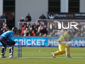 Australia's Glenn Maxwell reverse sweeps during the Metro Bank One Day Series match between England and Australia at the Seat Unique Riversi...