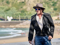 Johnny Depp attends the photocall of ''Modi, Three Days on the Wing of Madness'' during the 72nd San Sebastian International Film Festival i...