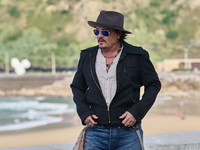 Johnny Depp attends the photocall of ''Modi, Three Days on the Wing of Madness'' during the 72nd San Sebastian International Film Festival i...