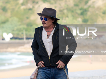 Johnny Depp attends the photocall of ''Modi, Three Days on the Wing of Madness'' during the 72nd San Sebastian International Film Festival i...