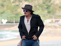 Johnny Depp attends the photocall of ''Modi, Three Days on the Wing of Madness'' during the 72nd San Sebastian International Film Festival i...