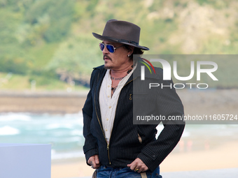 Johnny Depp attends the photocall of ''Modi, Three Days on the Wing of Madness'' during the 72nd San Sebastian International Film Festival i...