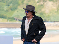 Johnny Depp attends the photocall of ''Modi, Three Days on the Wing of Madness'' during the 72nd San Sebastian International Film Festival i...