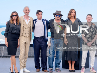 Johnny Depp attends the photocall of ''Modi, Three Days on the Wing of Madness'' during the 72nd San Sebastian International Film Festival....